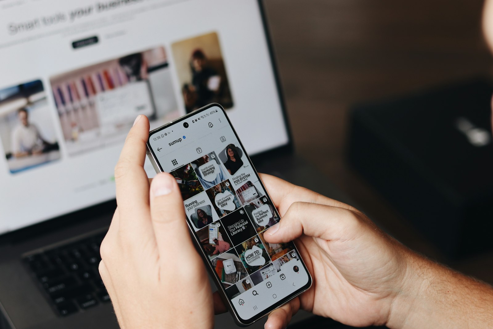 Business owner reviewing social media marketing on a smartphone, representing Facebook ads for accounting firms